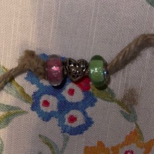 3 Disney Pandora beads and charm